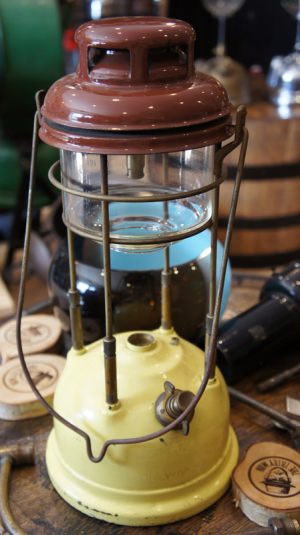 yellow and brown tilley lamp